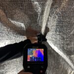 100% Reading of moisture retained by insulation behind moisture barrier